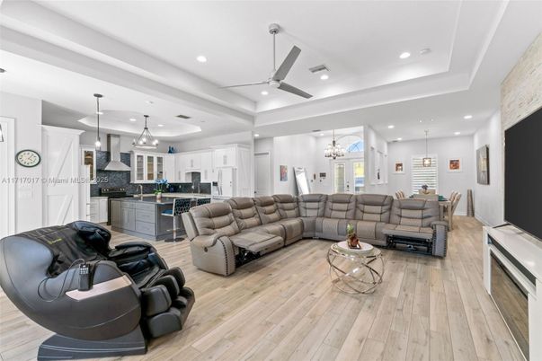 Chandelier, Dining room, Interior, Kitchen, Living room, Pendant Lights, Recessed Lighting, Wood Texture Flooring