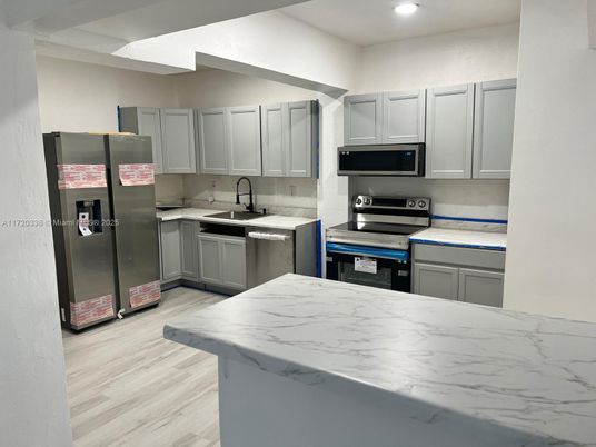 Interior, Kitchen, Recessed Lighting, Stainless Steel Appliances, Wood Texture Flooring
