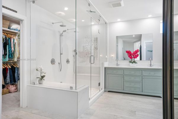 Bathroom, Dual Sink Vanities, Glass Shower, Interior, Recessed Lighting, Walk-in Closets