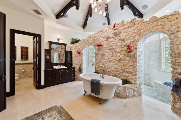 Bathroom, Dual Sink Vanities, Free Standing Baths, Glass Shower, Interior, Recessed Lighting, Stone Walls