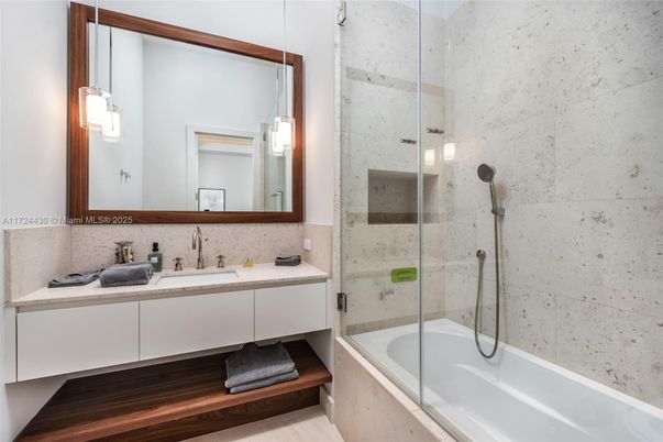 Bathroom, Dual Sink Vanities, Glass Shower, Interior, Pendant Lights, Wood Texture Flooring