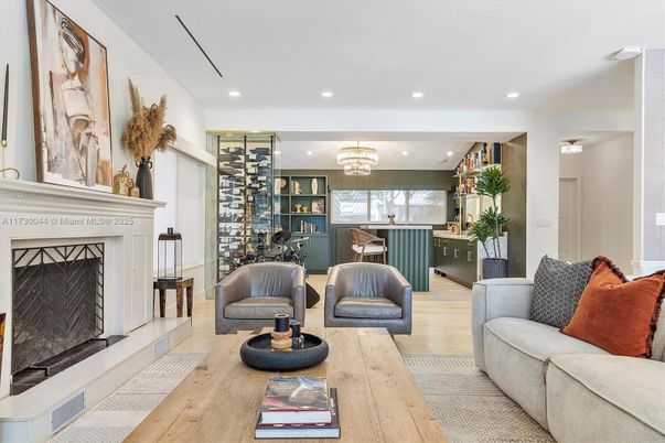 Chandelier, Fireplace, Interior, Living room, Recessed Lighting, Wine Storage, Wood Texture Flooring