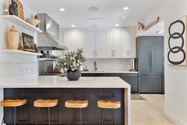 Interior, Kitchen, Marble Walls, Recessed Lighting, Stainless Steel Appliances, Wood Texture Flooring