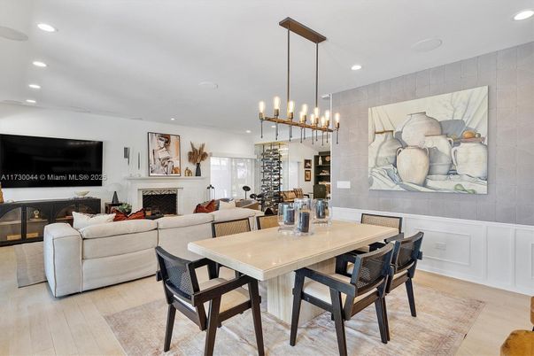 Dining room, Fireplace, Interior, Living room, Pendant Lights, Recessed Lighting, Wood Texture Flooring
