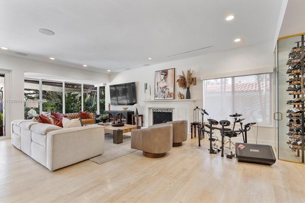 Fireplace, Fitness Equipment, Interior, Living room, Recessed Lighting, Wood Texture Flooring