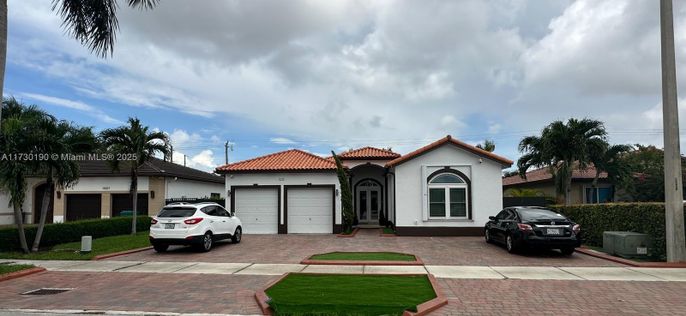 Attached, Exterior, Facade, Spanish Mediterranean