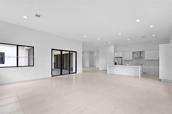 Interior, Kitchen, Marble Walls, Recessed Lighting, Stainless Steel Appliances