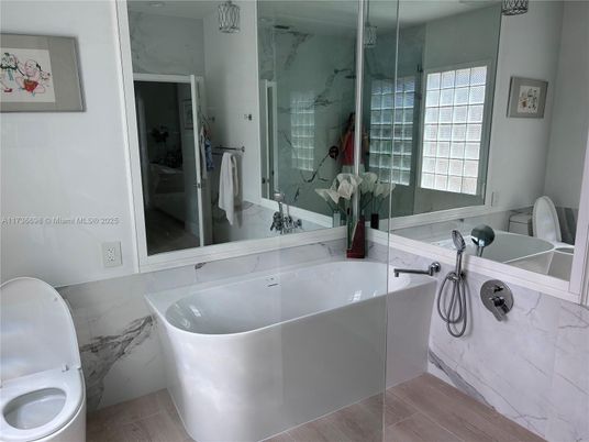 Bathroom, Dual Sink Vanities, Free Standing Baths, Glass Shower, Interior, Marble Walls