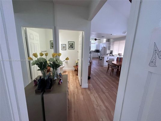 Dining room, Interior, Kitchen, Recessed Lighting, Stainless Steel Appliances, Wood Texture Flooring