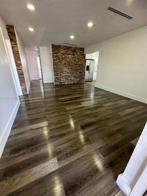 Empty room, Interior, Recessed Lighting, Stone Walls, Wood Texture Flooring