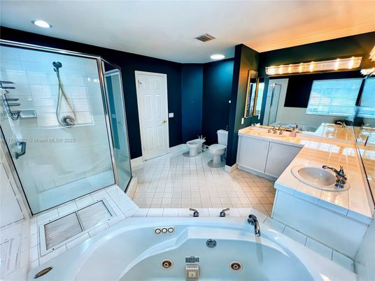 Bathroom, Dual Sink Vanities, Glass Shower, Interior, Recessed Lighting, Tile Countertops