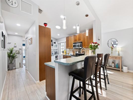 Interior, Kitchen, Pendant Lights, Recessed Lighting, Stainless Steel Appliances, Wood Texture Flooring