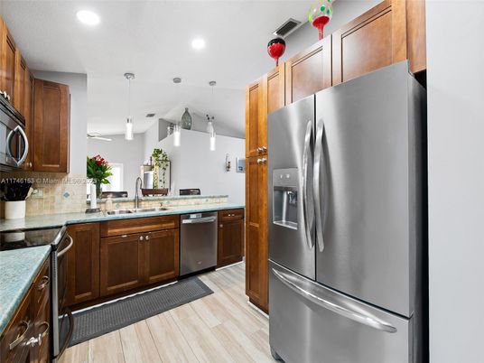 Interior, Kitchen, Pendant Lights, Recessed Lighting, Stainless Steel Appliances, Wood Texture Flooring