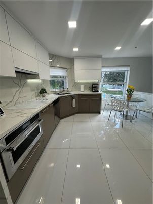 Dining room, Interior, Kitchen, Marble Walls, Recessed Lighting, Stainless Steel Appliances