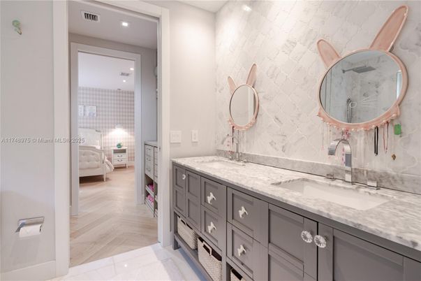 Bathroom, Dual Sink Vanities, Interior, Recessed Lighting, Wood Texture Flooring