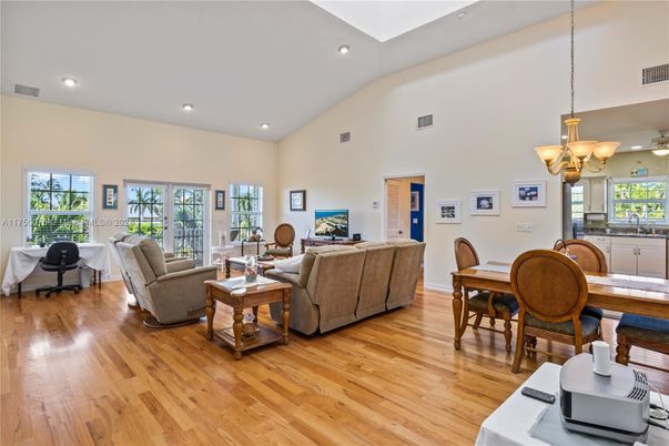 Chandelier, Dining room, Interior, Living room, Recessed Lighting, Wood Texture Flooring