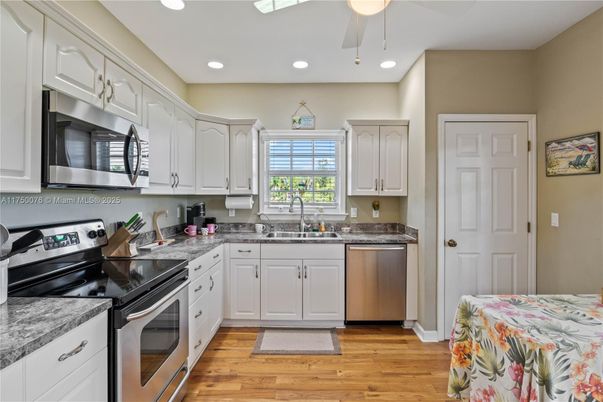 Interior, Kitchen, Recessed Lighting, Stainless Steel Appliances, Wood Texture Flooring