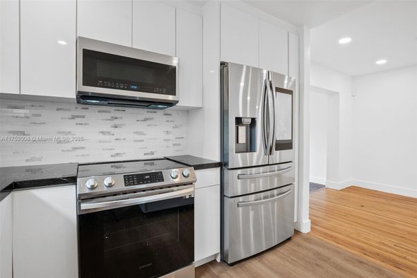 Interior, Kitchen, Recessed Lighting, Stainless Steel Appliances, Wood Texture Flooring