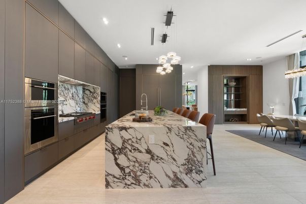 Dining room, Interior, Kitchen, Marble Walls, Pendant Lights, Recessed Lighting, Stainless Steel Appliances