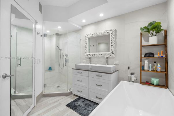 Bathroom, Glass Shower, Interior, Marble Walls, Recessed Lighting, Wood Texture Flooring