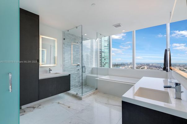 Bathroom, Dual Sink Vanities, Glass Shower, Interior, Marble, Recessed Lighting