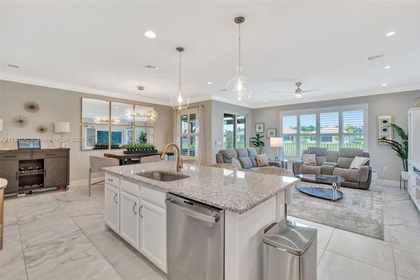 Chandelier, Dining room, Interior, Kitchen, Living room, Marble, Pendant Lights, Recessed Lighting, Stainless Steel Appliances