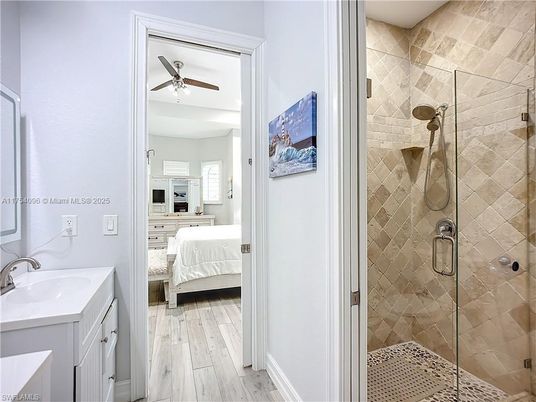 Bathroom, Bedroom, Glass Shower, Interior, Stone Walls, Wood Texture Flooring