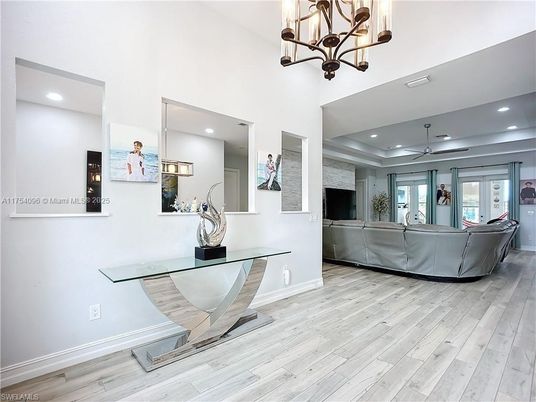 Chandelier, Interior, Living room, Recessed Lighting, Wood Texture Flooring