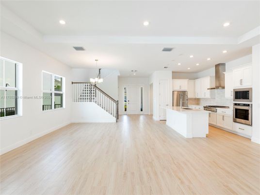 Chandelier, Interior, Kitchen, Recessed Lighting, Stainless Steel Appliances, Wood Texture Flooring