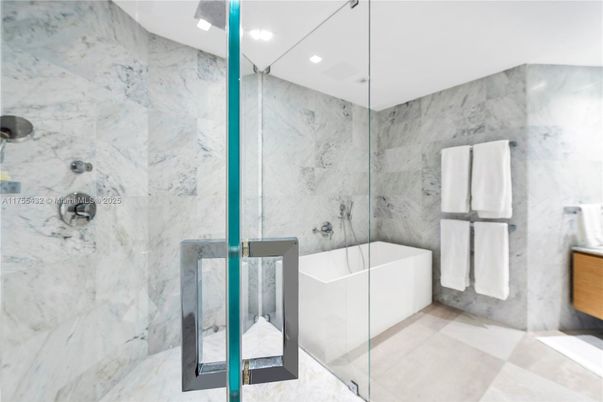 Bathroom, Free Standing Baths, Glass Shower, Interior, Marble Walls, Recessed Lighting