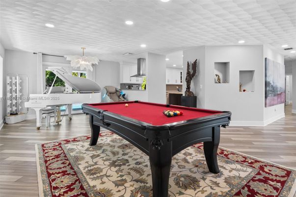 Billiard Table, Chandelier, Game Room, Interior, Piano, Recessed Lighting, Wood Texture Flooring
