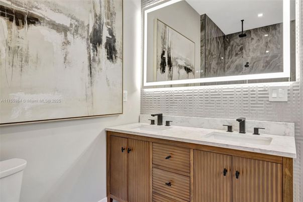 Bathroom, Dual Sink Vanities, Interior, Marble Walls, Recessed Lighting