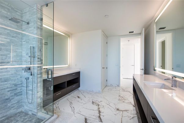 Bathroom, Dual Sink Vanities, Glass Shower, Interior, Marble, Recessed Lighting