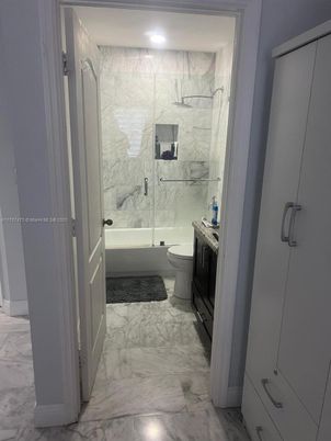 Bathroom, Free Standing Baths, Glass Shower, Interior, Marble, Marble Walls, Recessed Lighting