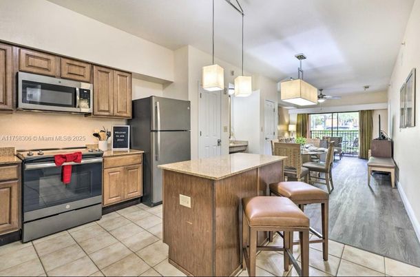Dining room, Interior, Kitchen, Pendant Lights, Stainless Steel Appliances, Wood Texture Flooring