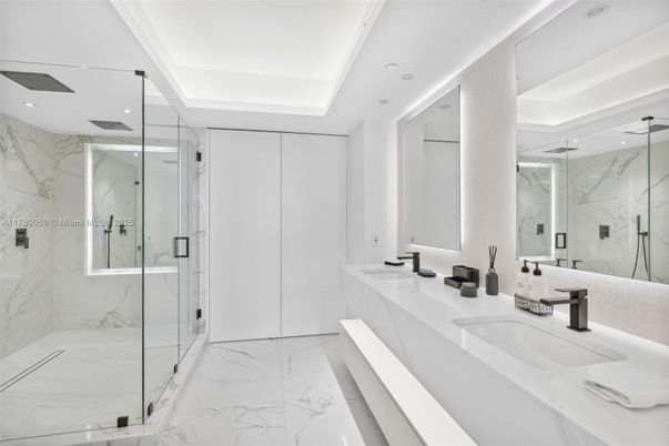 Bathroom, Dual Sink Vanities, Glass Shower, Interior, Marble, Marble Walls, Recessed Lighting