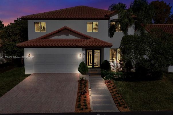 Attached, Exterior, Facade, Spanish Mediterranean