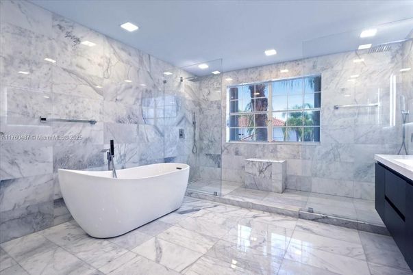 Bathroom, Free Standing Baths, Glass Shower, Interior, Marble, Marble Walls, Recessed Lighting