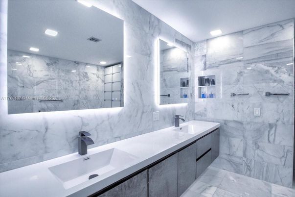 Bathroom, Dual Sink Vanities, Interior, Marble, Marble Walls, Recessed Lighting