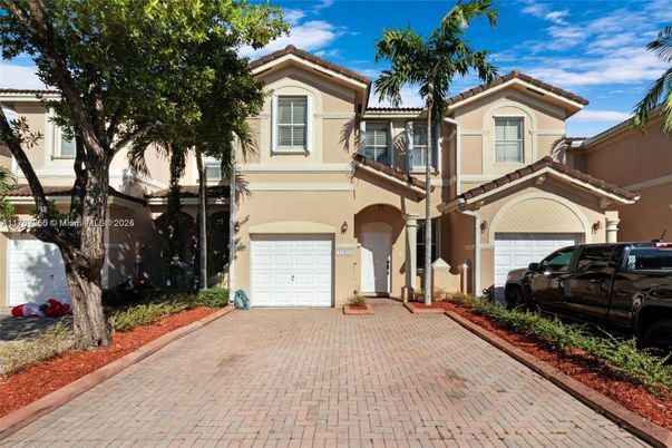 Attached, Exterior, Facade, Mediterranean