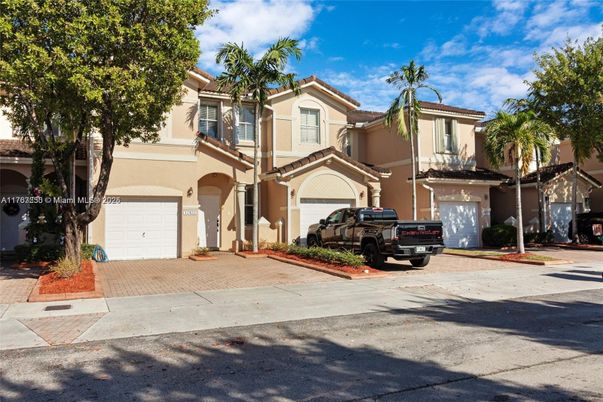Attached, Exterior, Facade, Mediterranean