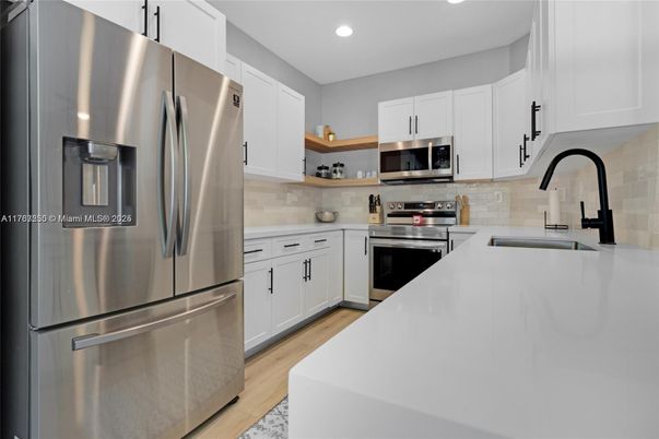 Interior, Kitchen, Recessed Lighting, Stainless Steel Appliances, Wood Texture Flooring