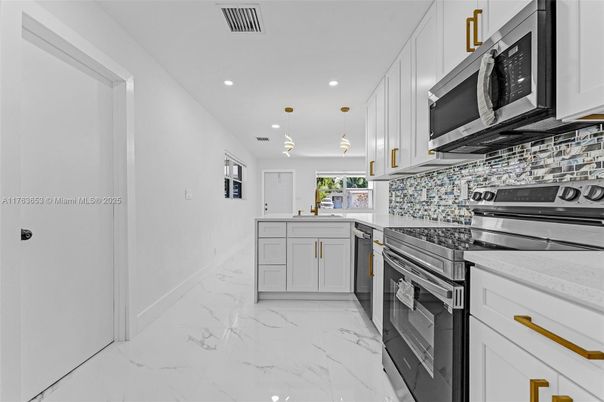 Interior, Kitchen, Marble, Pendant Lights, Recessed Lighting, Stainless Steel Appliances