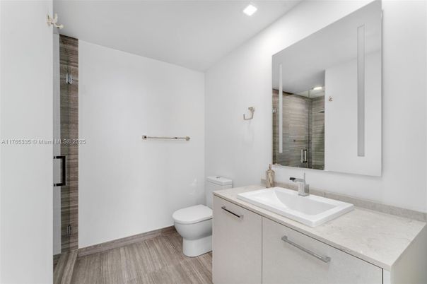 Bathroom, Glass Shower, Interior, Recessed Lighting, Wood Texture Flooring