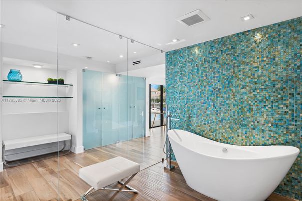 Bathroom, Free Standing Baths, Glass Shower, Interior, Recessed Lighting, Wood Texture Flooring