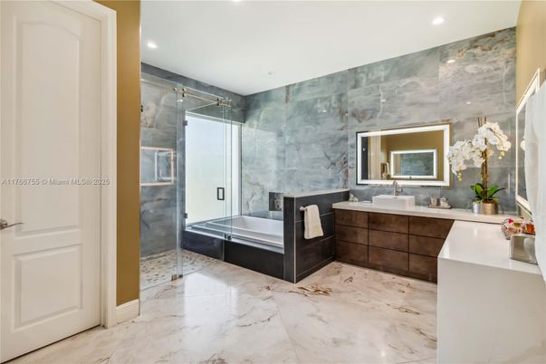 Bathroom, Dual Sink Vanities, Glass Shower, Interior, Marble, Recessed Lighting