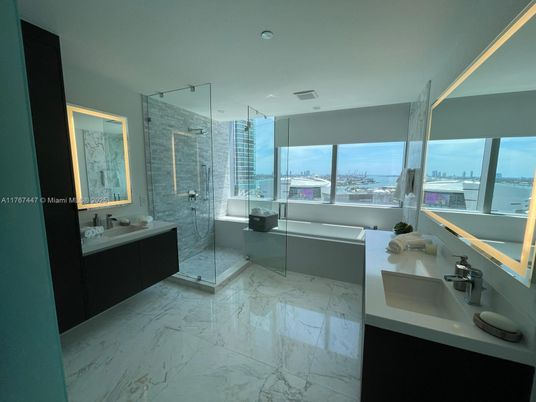 Bathroom, Dual Sink Vanities, Glass Shower, Interior, Marble, Recessed Lighting, Water