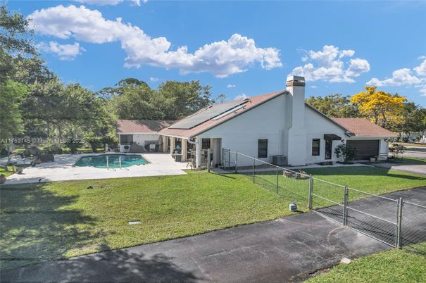 Exterior, Pool, Solar Panels
