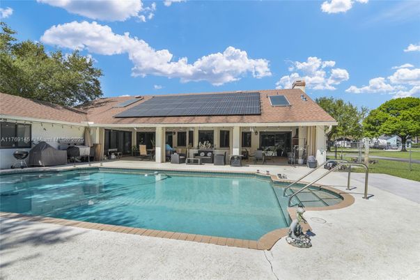 Exterior, Pool, Solar Panels