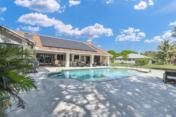 Exterior, Pool, Solar Panels